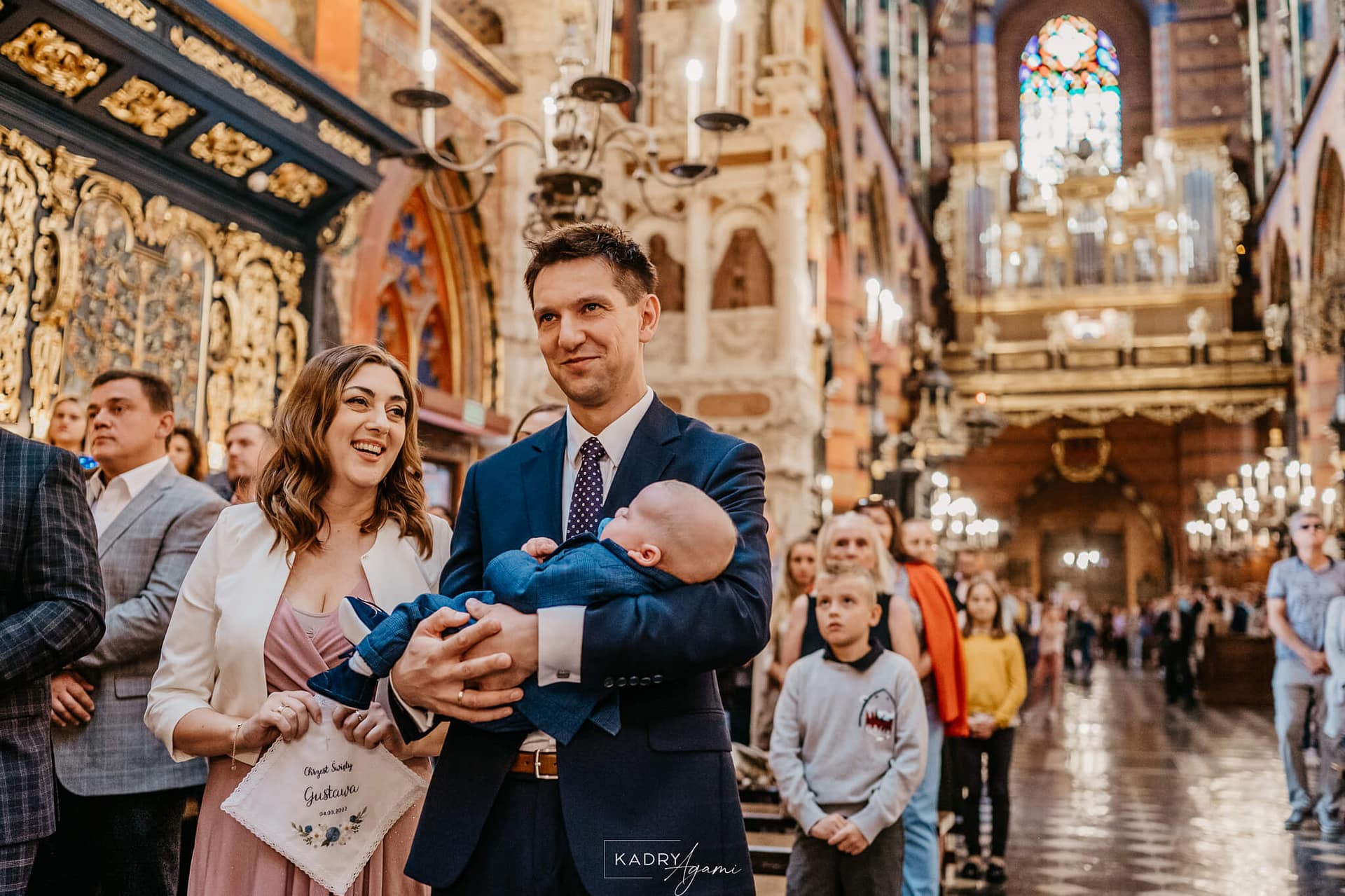 chrzest święty w Bazylice Mariackiej w centrum Krakowa